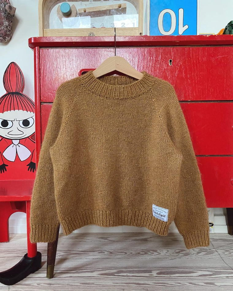 Barn iført brun Ingen Dikkedarer Sweater Junior